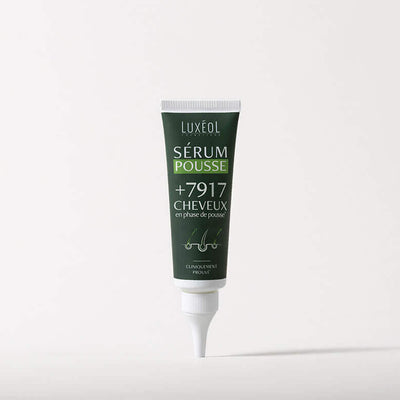 Hair Density Serum tube on white background.